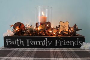 Large painted wooden box with lights and candle Faith Family Friends